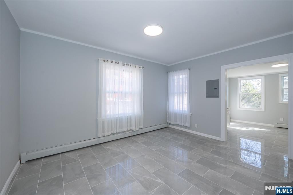 723 East 26th Street Paterson, NJ 07504 - Photo 27 of 41 a view of an empty room with a window