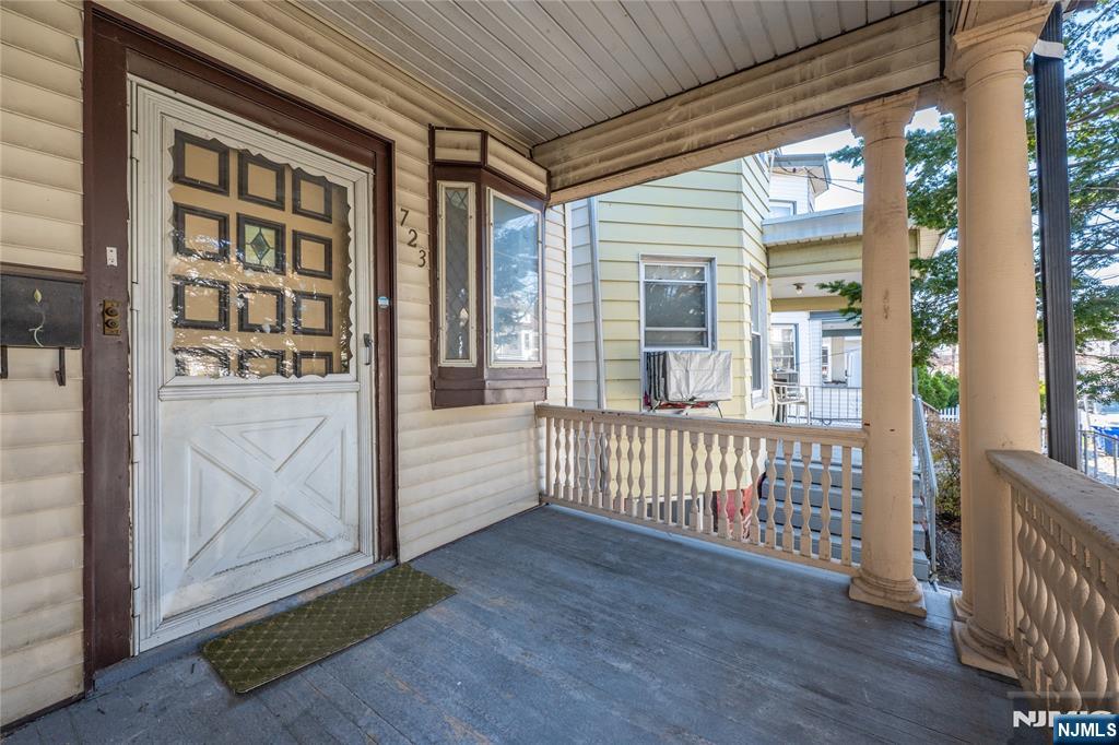 723 East 26th Street Paterson, NJ 07504 - Photo 39 of 41 a view of porch with a bench