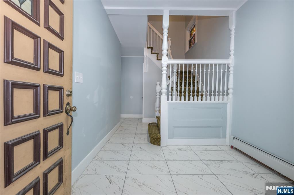 723 East 26th Street Paterson, NJ 07504 - Photo 41 of 41 a view of an entryway with staircase