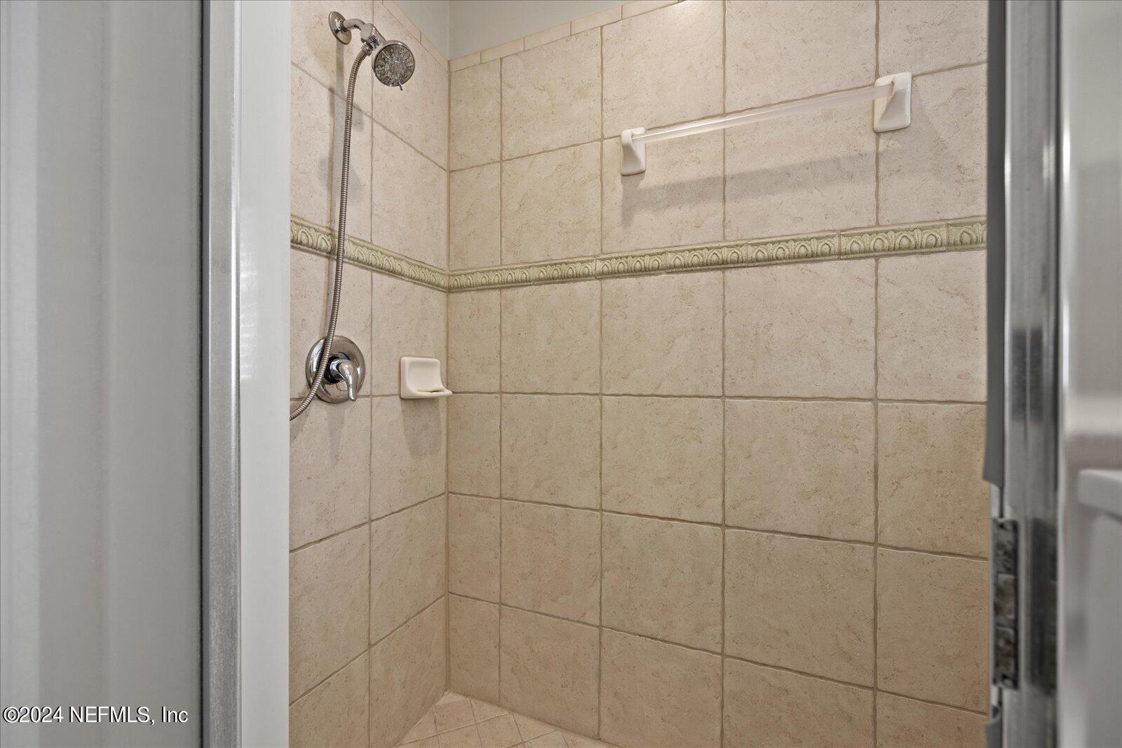 1283 Paradise Pond Road St. Augustine, FL 32092 - Photo 24 of 47 a bathroom with a shower
