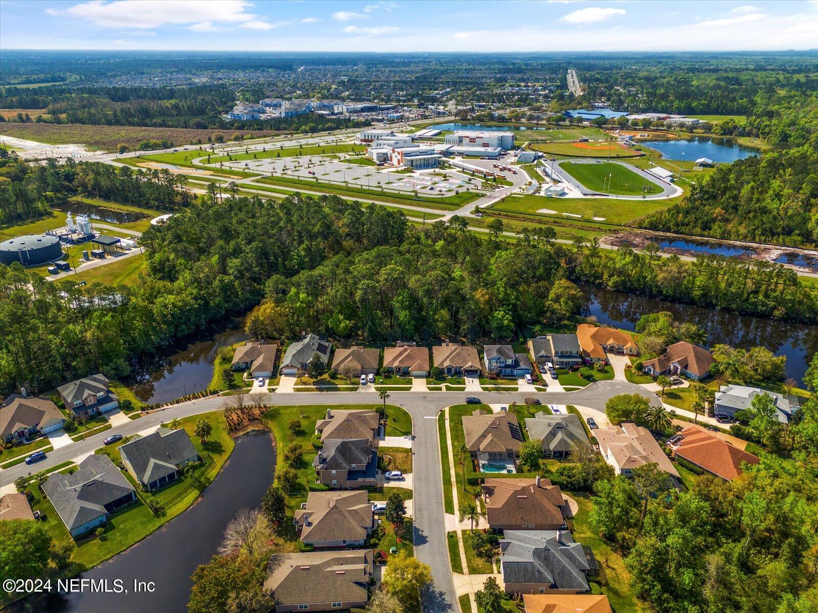 1283 Paradise Pond Road St. Augustine, FL 32092 - Photo 45 of 47 a view of a city with lawn chairs