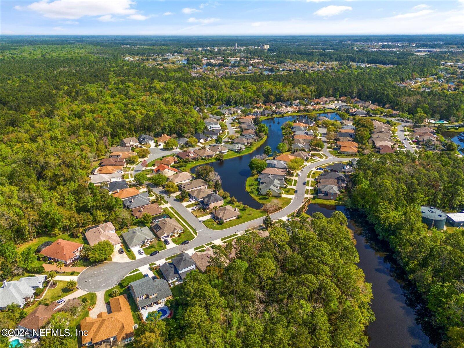 1283 Paradise Pond Road St. Augustine, FL 32092 - Photo 46 of 47 an aerial view of residential houses with outdoor space and trees