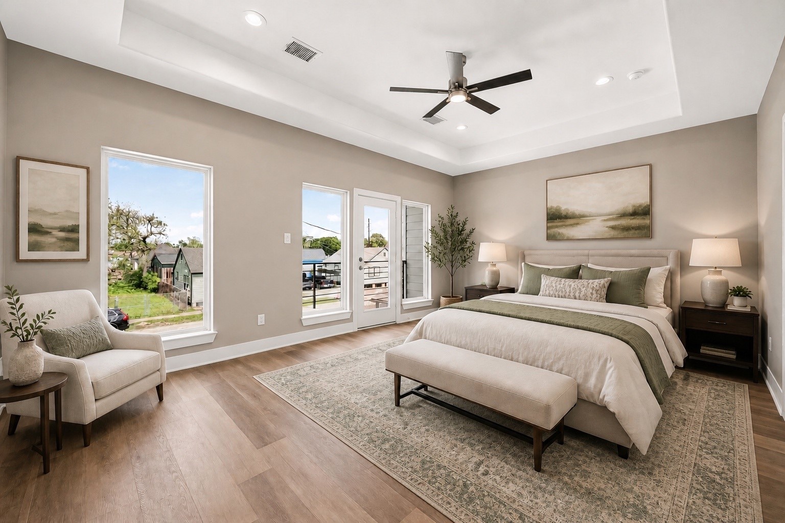 3514 Runnels Street, Unit B Houston, TX 77003 - Photo 14 of 39 The primary bedroom is LARGE. The raised tray ceiling even increases that feeling of height and spaciousness. Photo is virtually staged to give you some ideas for furniture placement.