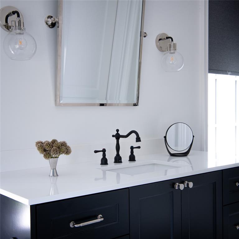 5947 Lupton Drive Dallas, TX 75225 - Photo 18 of 39 Bathroom with vanity