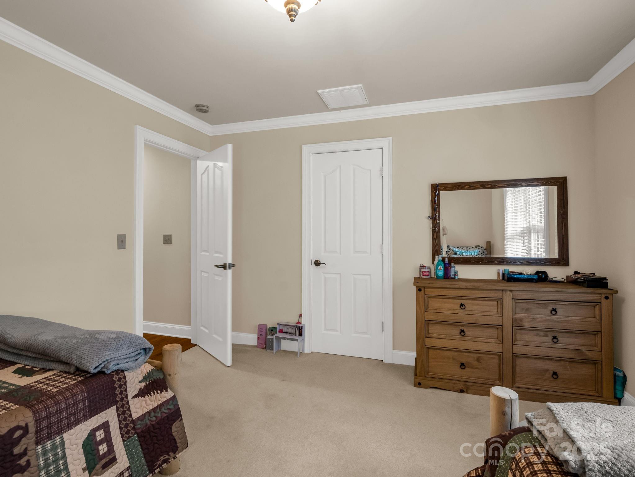 45 Brown Bear Ridge Trail Zirconia, NC 28790 - Photo 25 of 47 a living room with furniture and a flat screen tv