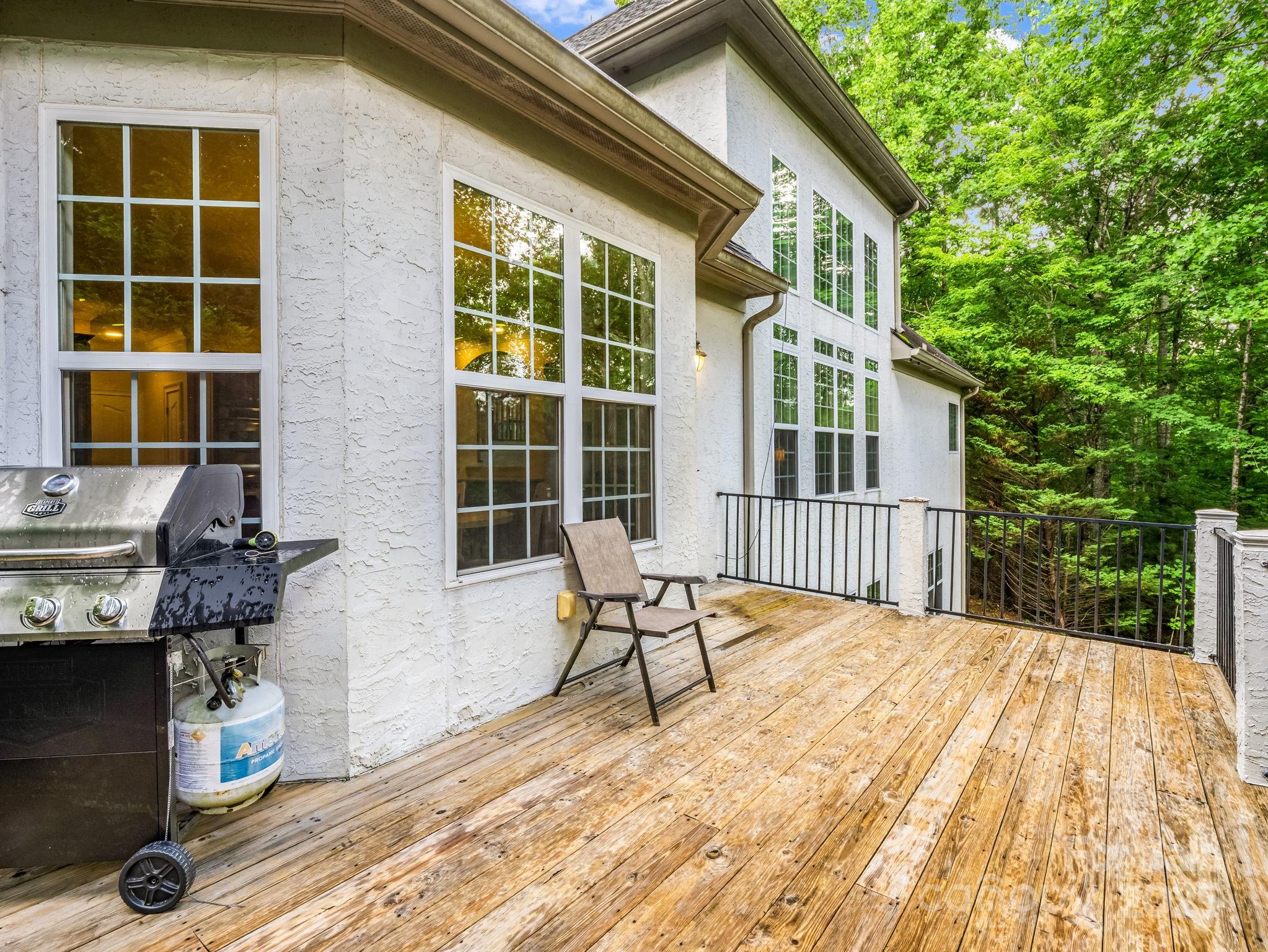 45 Brown Bear Ridge Trail Zirconia, NC 28790 - Photo 43 of 47 a balcony with table and chairs