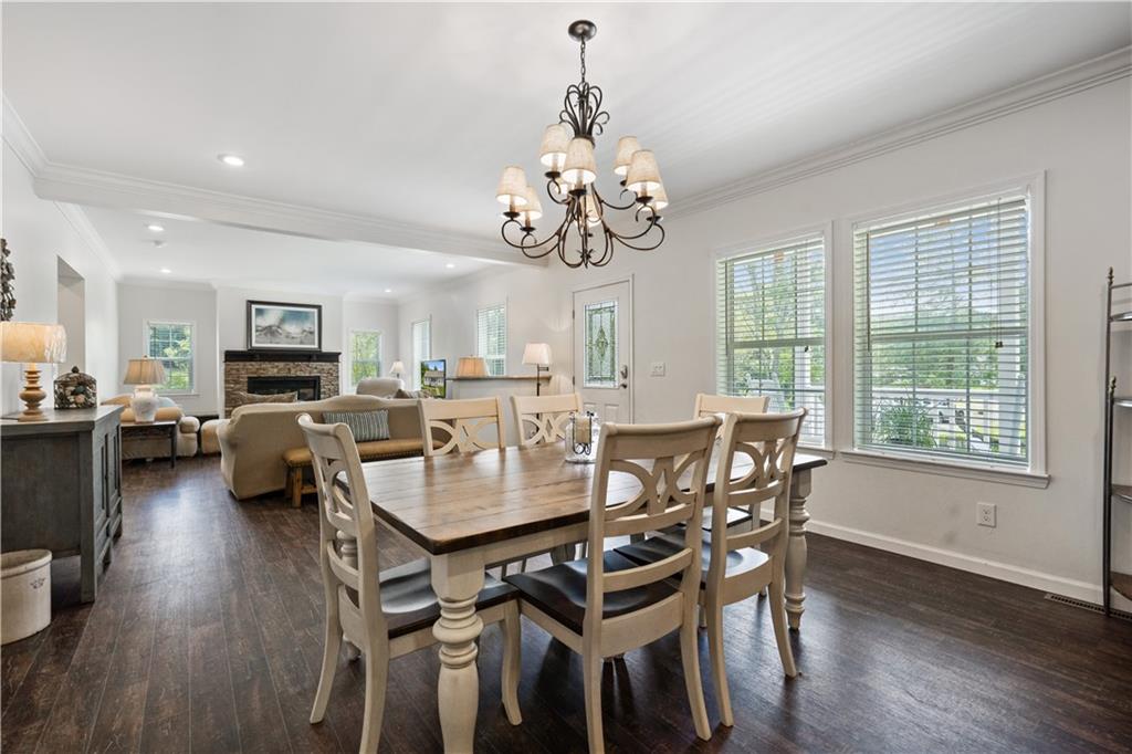 210 Shoaf Road Smithfield, PA 15478 - Photo 13 of 25 a view of a dining room with furniture wooden floor and chandelier