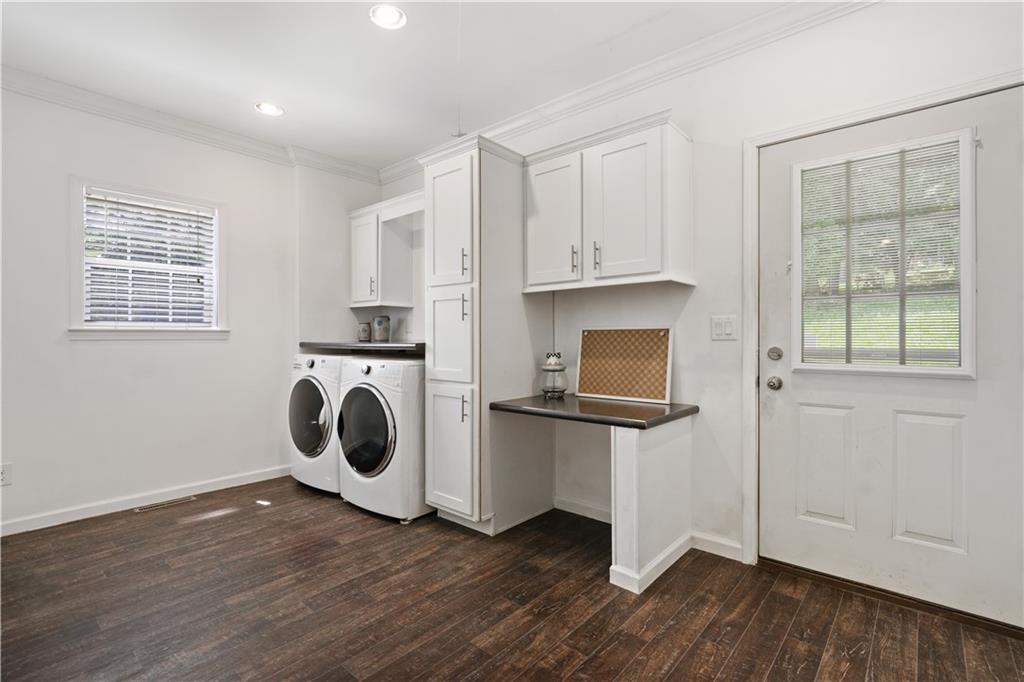210 Shoaf Road Smithfield, PA 15478 - Photo 17 of 25 a kitchen with wooden floors and white cabinets