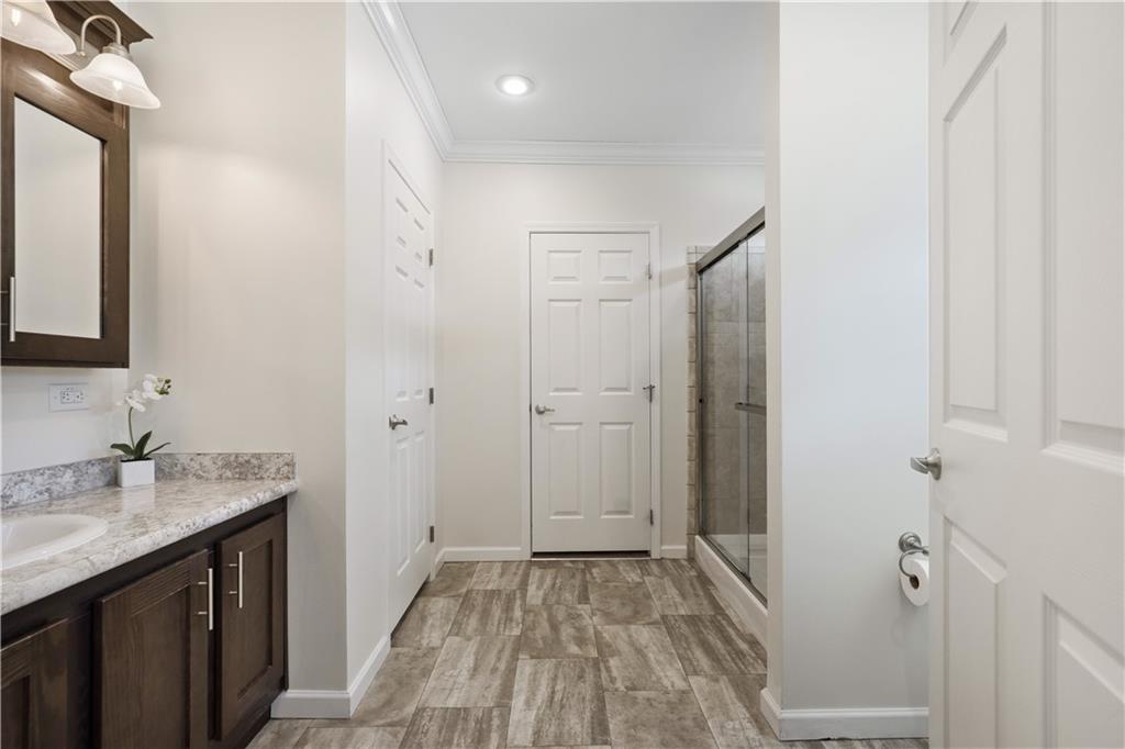 210 Shoaf Road Smithfield, PA 15478 - Photo 21 of 25 a bathroom with a sink and a mirror