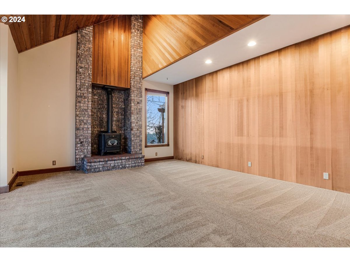 43385 Southeast Music Camp Road Sandy, OR 97055 - Photo 4 of 48 a view of an empty room with a fireplace