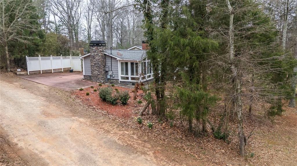 3819 Mason Creek Road Winston, GA 30187 - Photo 28 of 54 a view of a house with backyard and sitting area