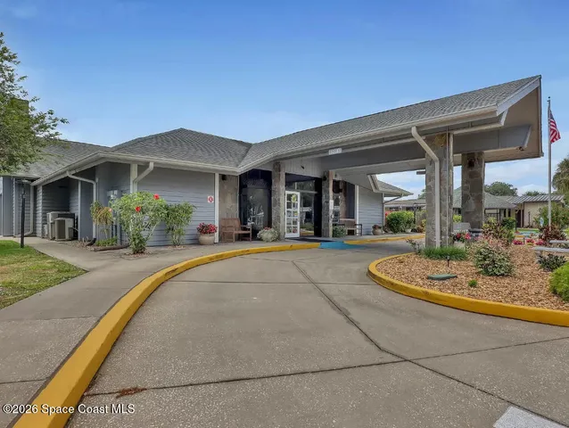 a view of a house with entertaining space and plants