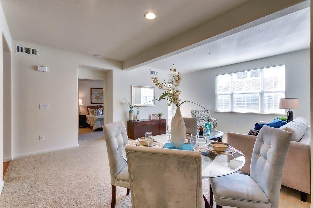 1883 Agnew Road, Unit 329 Santa Clara, CA 95054 - Photo 13 of 46 a living room with furniture and a wooden floor