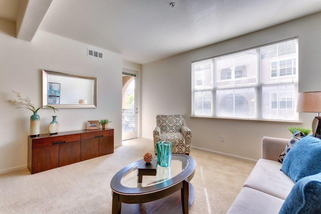 1883 Agnew Road, Unit 329 Santa Clara, CA 95054 - Photo 14 of 46 a living room with furniture and a table