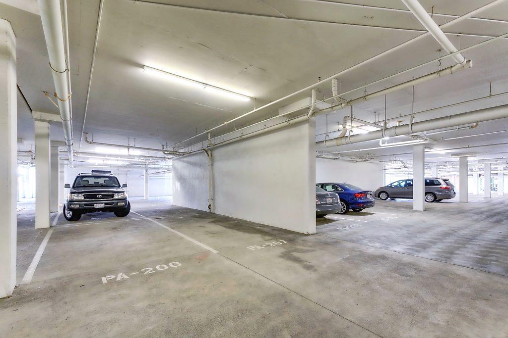1883 Agnew Road, Unit 329 Santa Clara, CA 95054 - Photo 26 of 46 a view of a garage with parked cars