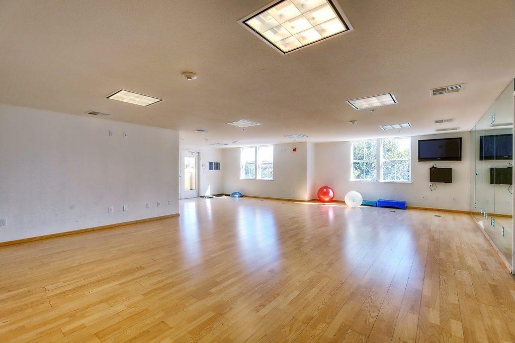 1883 Agnew Road, Unit 329 Santa Clara, CA 95054 - Photo 28 of 46 a view of empty room with wooden floor and fan
