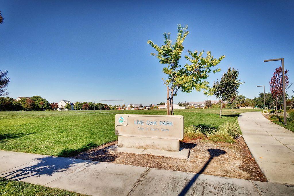 1883 Agnew Road, Unit 329 Santa Clara, CA 95054 - Photo 36 of 46 a view of a garden with a bench