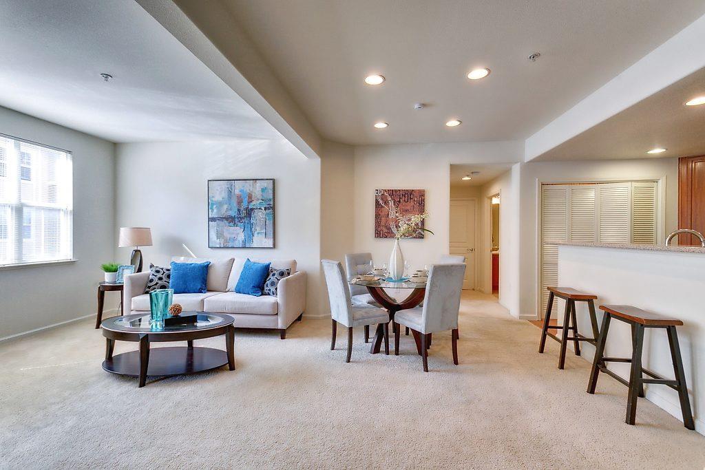 1883 Agnew Road, Unit 329 Santa Clara, CA 95054 - Photo 10 of 46 a living room with furniture and a large window