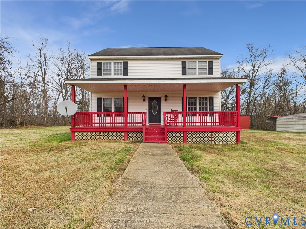 View of front of property with a porch and a front