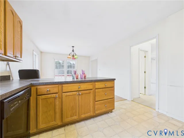 a view of kitchen and wooden floor
