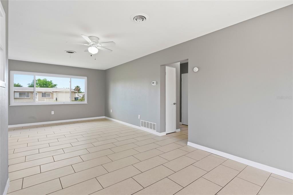 363 Glen Oak Road Venice, FL 34293 - Photo 15 of 53 a view of an empty room with a window