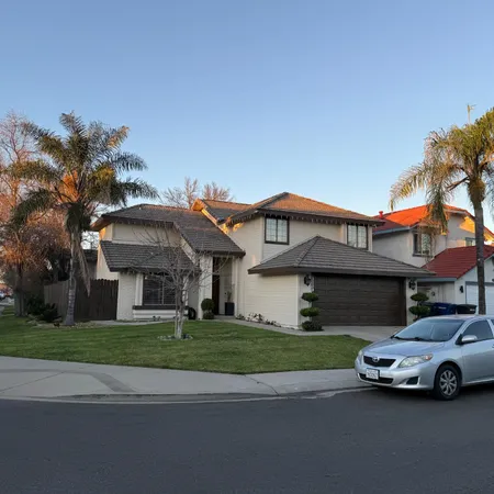 a car parked in front of a house