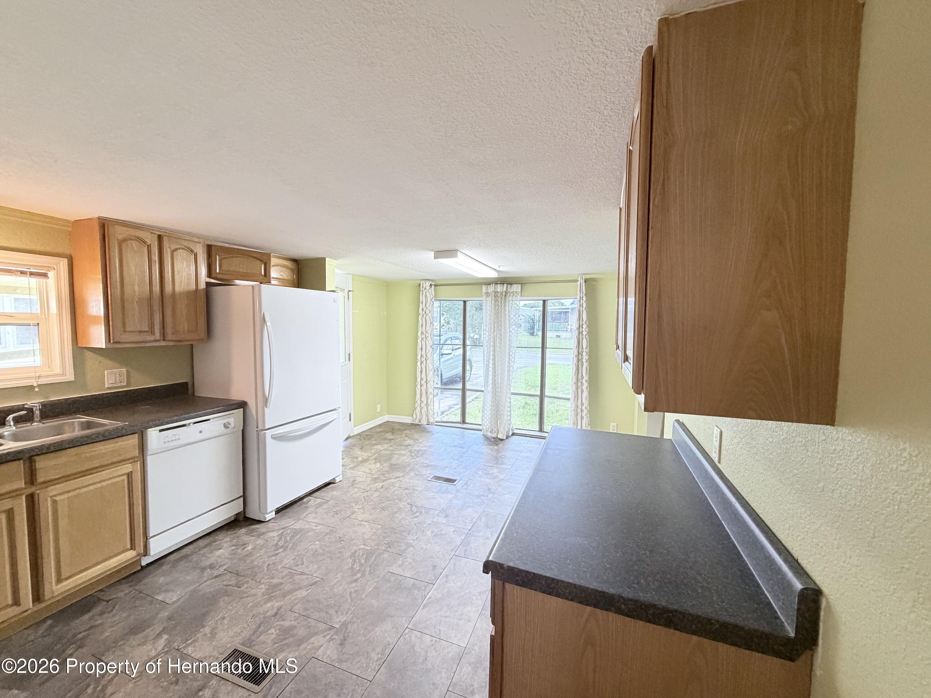 14224 Sandhurst Street Spring Hill, FL 34613 - Photo 3 of 29
