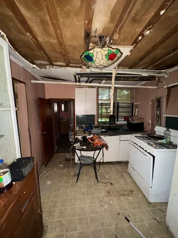 a bathroom with a toilet and a sink
