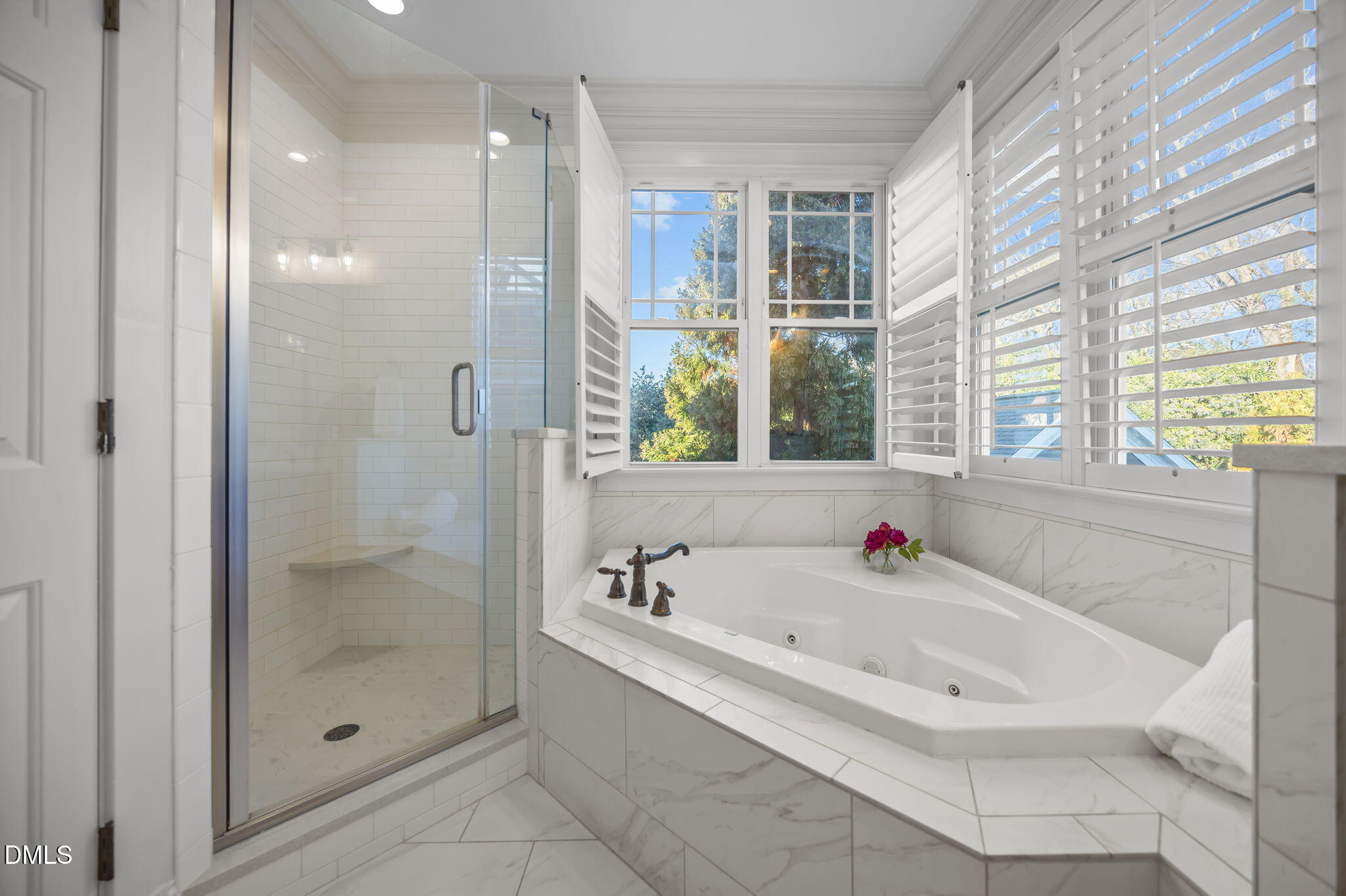 1705 Carson Street Raleigh, NC 27608 - Photo 25 of 47 a bathroom with a bathtub and a shower