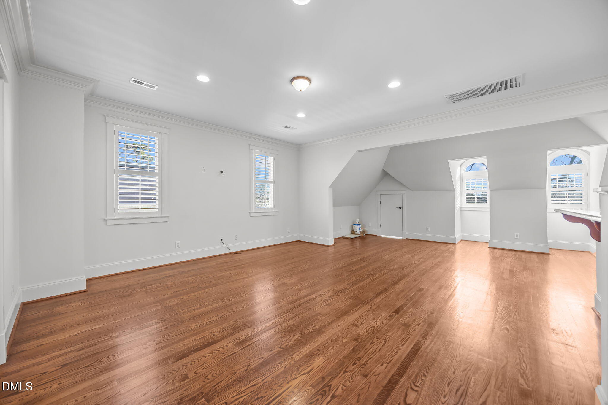 1705 Carson Street Raleigh, NC 27608 - Photo 31 of 47 a view of empty room with wooden floor and fan