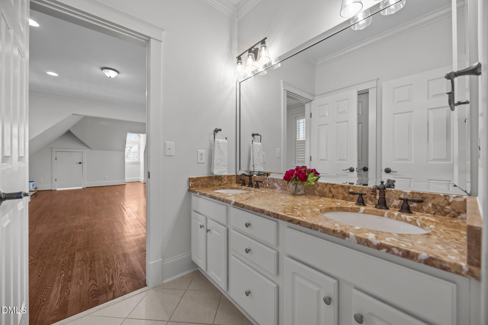 1705 Carson Street Raleigh, NC 27608 - Photo 36 of 47 a bathroom with a double vanity sink and a mirror