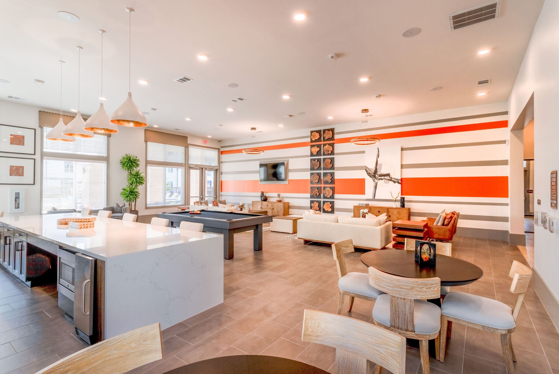 13939 Hillcroft Avenue, Unit 5305 Houston, TX 77085 - Photo 10 of 23 a large kitchen with a table and chairs