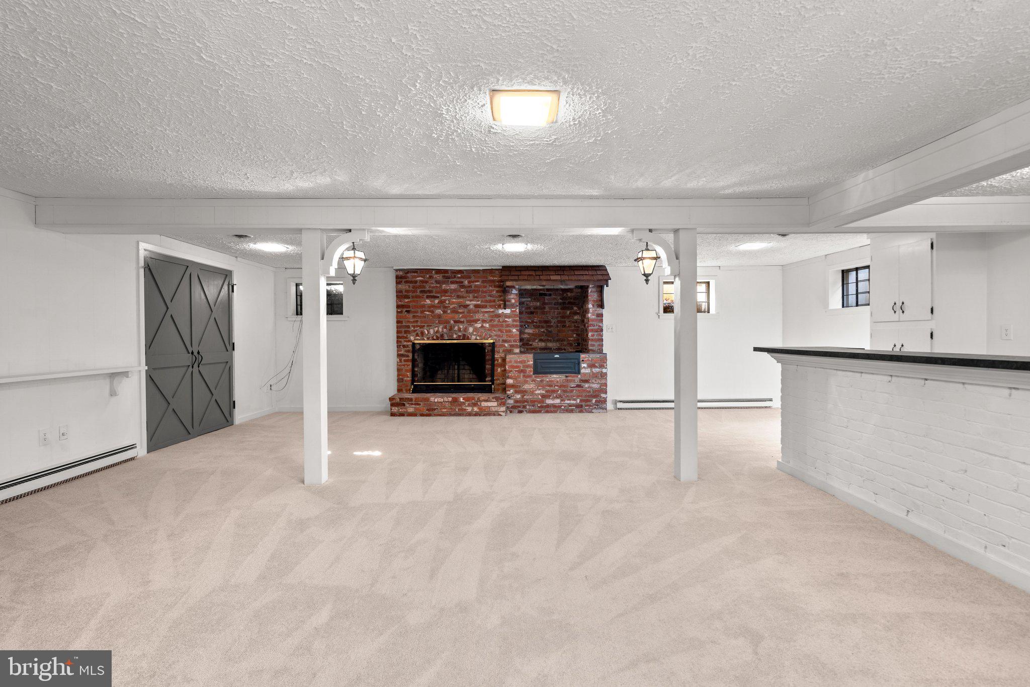 25915 Woodfield Road Damascus, MD 20872 - Photo 41 of 61 Brick Fireplace