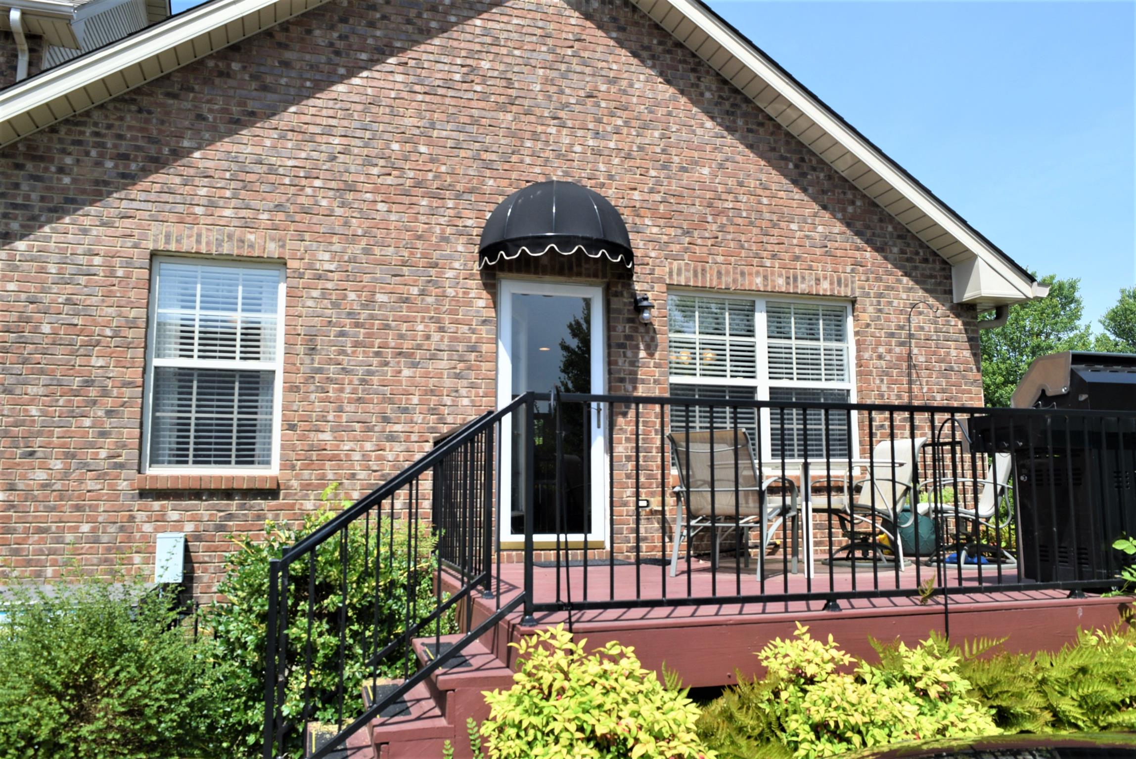 135 Excell Road, Unit 301 Clarksville, TN 37043 - Photo 5 of 5 a view of a house with a iron gate