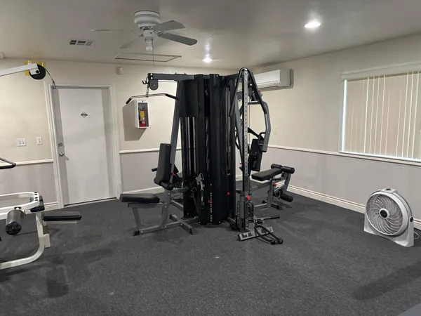 a view of a room with gym equipment