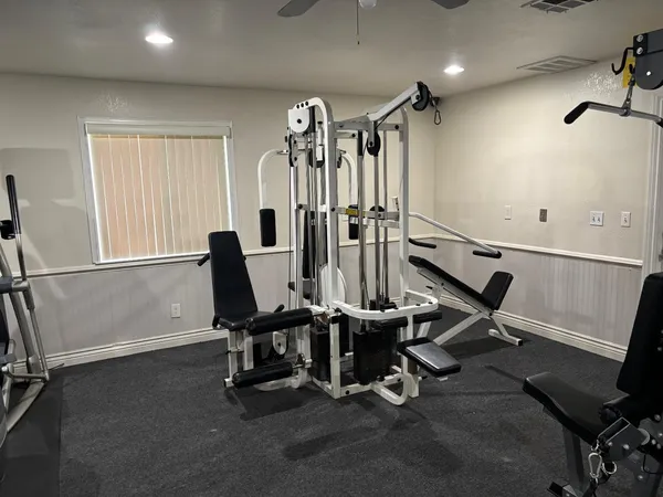 a view of a room with gym equipment
