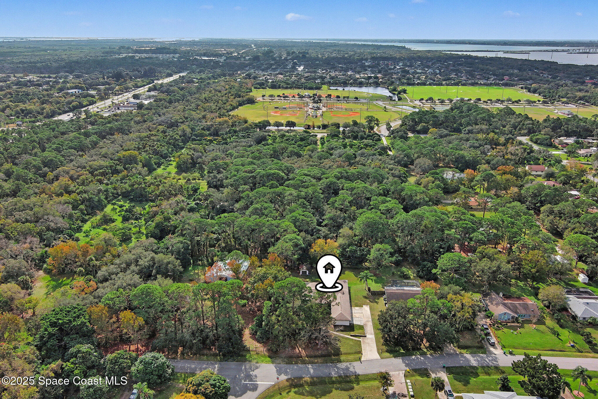 265 Mockingbird Lane Merritt Island, FL 32953 - Photo 29 of 34 a view of a lake with a mountain