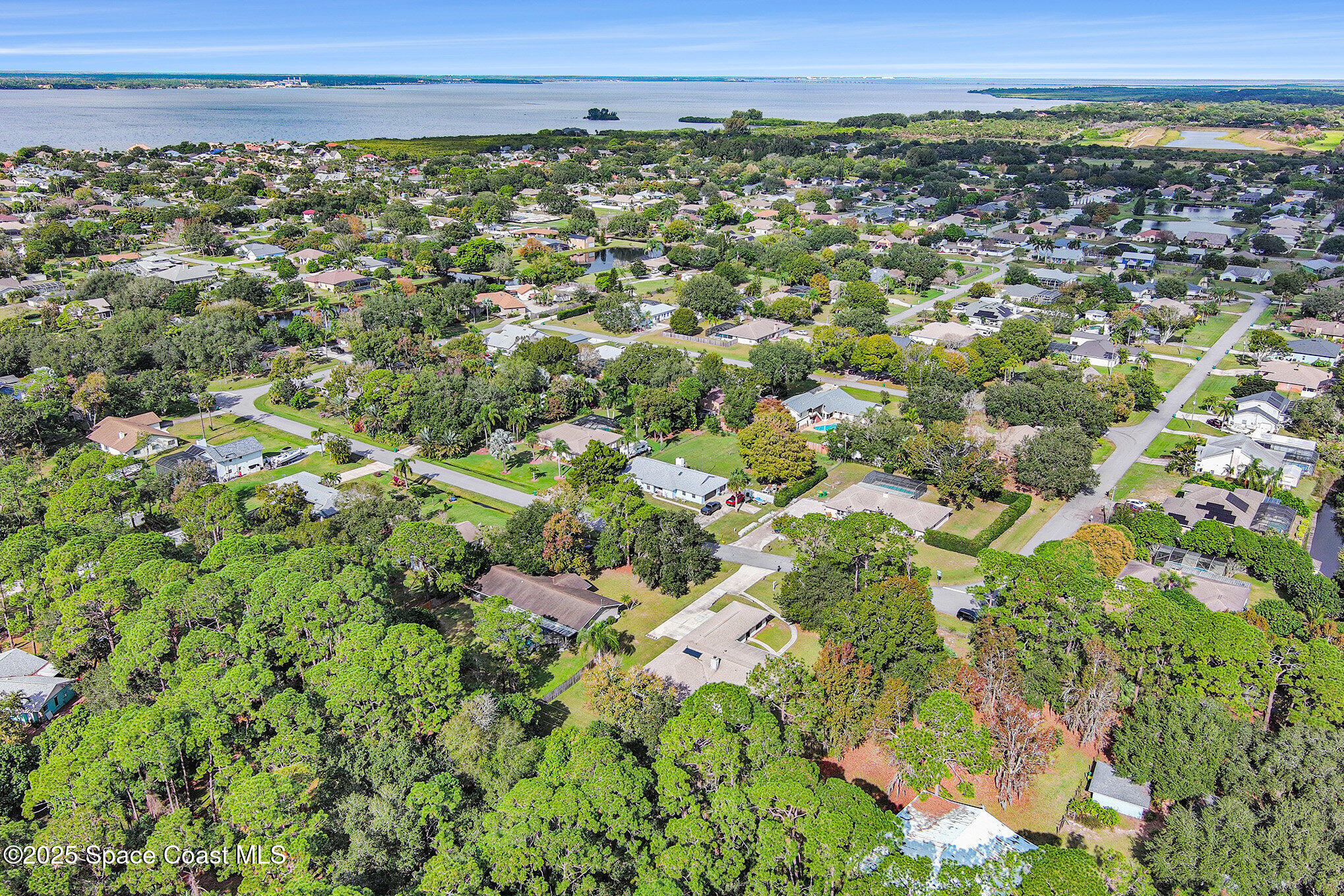 265 Mockingbird Lane Merritt Island, FL 32953 - Photo 30 of 34 a view of a large green field