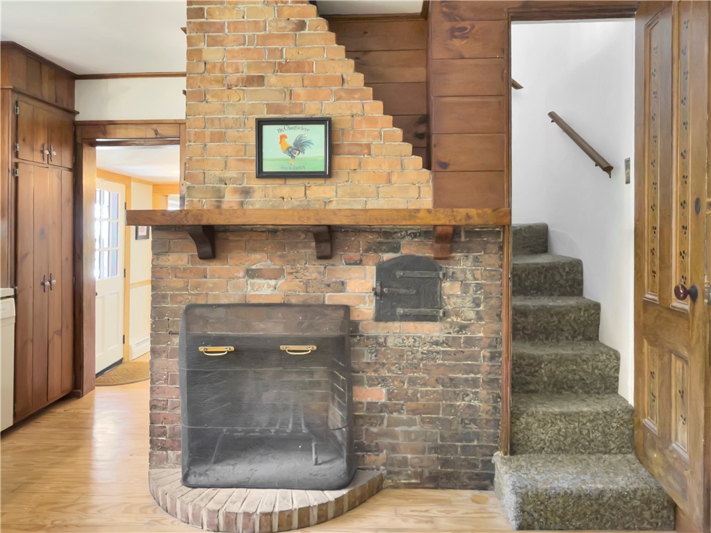 33 Indian Pond Road Kingston, MA 02364 - Photo 17 of 44 Kitchen w/ winding second set of stairs to 2nd floor