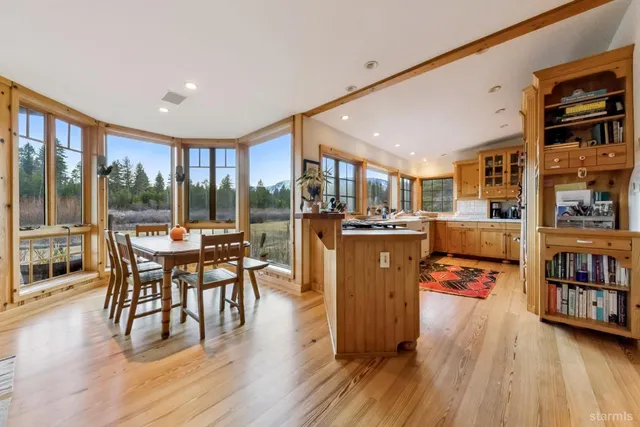 a kitchen with a stove a sink and a refrigerator