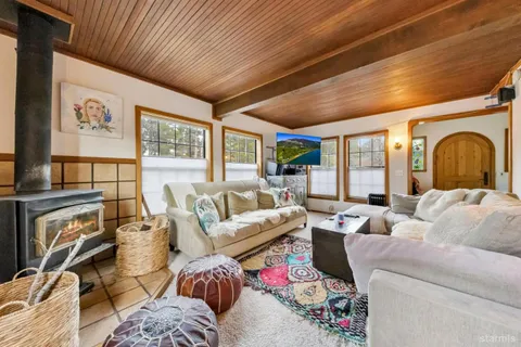 a bed sitting in middle of a building