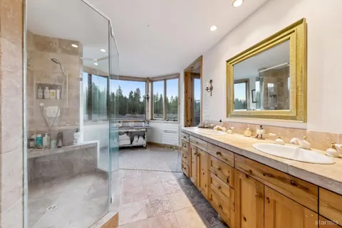 a building outdoor space with patio furniture and wooden floor