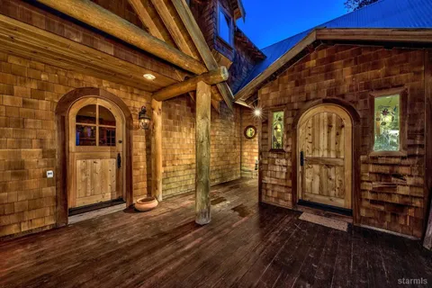 a view of a wooden door with a outdoor space