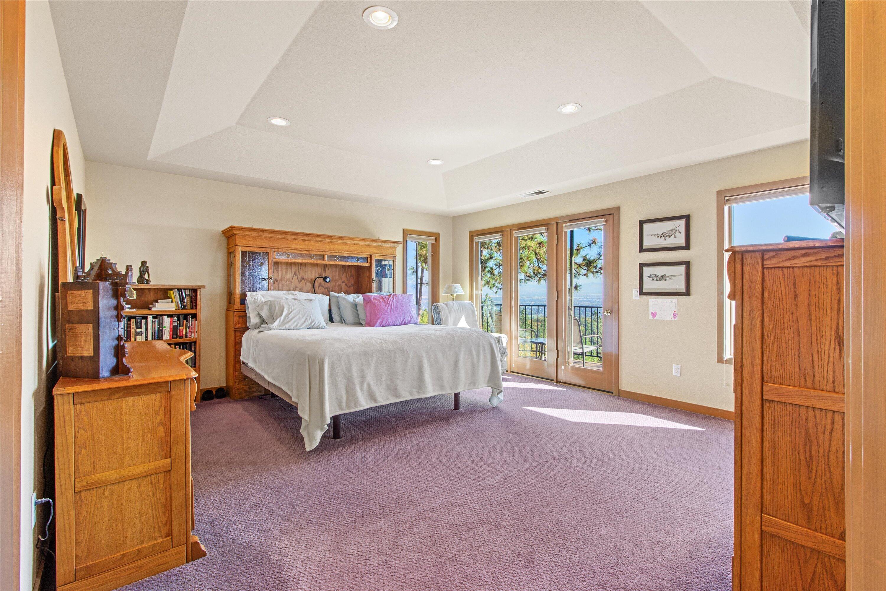 2801 Old Military Road Central Point, OR 97502 - Photo 22 of 49 a bed room with a bed and a walk in closet