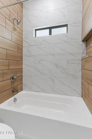 a bathroom with a bathtub