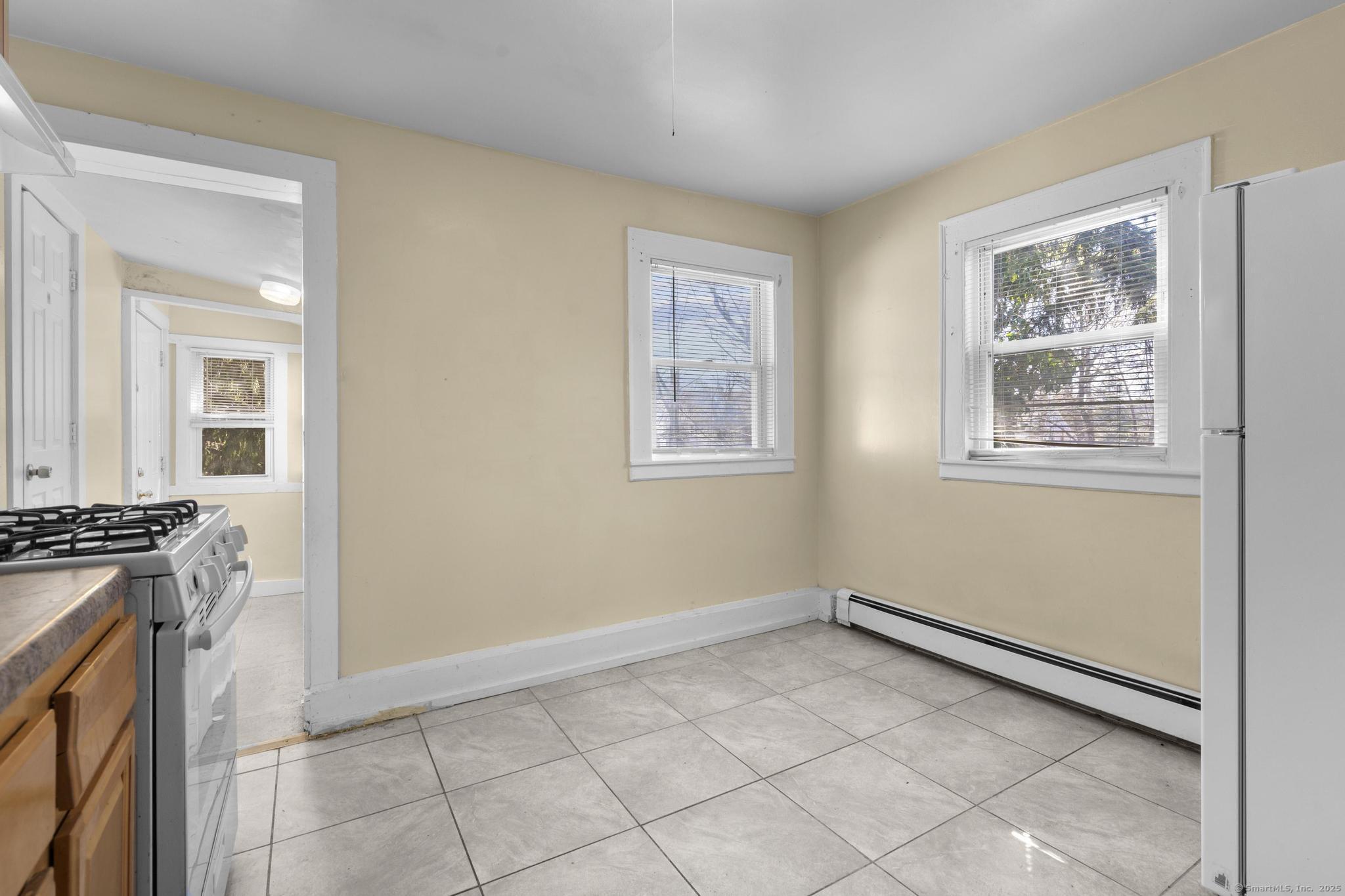 122 Derby Avenue New Haven, CT 06511 - Photo 12 of 26 an empty room with windows