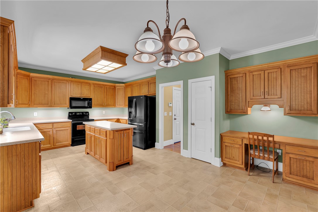 406 Hopewell Ridge Anderson, SC 29621 - Photo 8 of 46 This spacious kitchen offers ample cabinet storage, a functional island, and convenient access to adjoining rooms.
