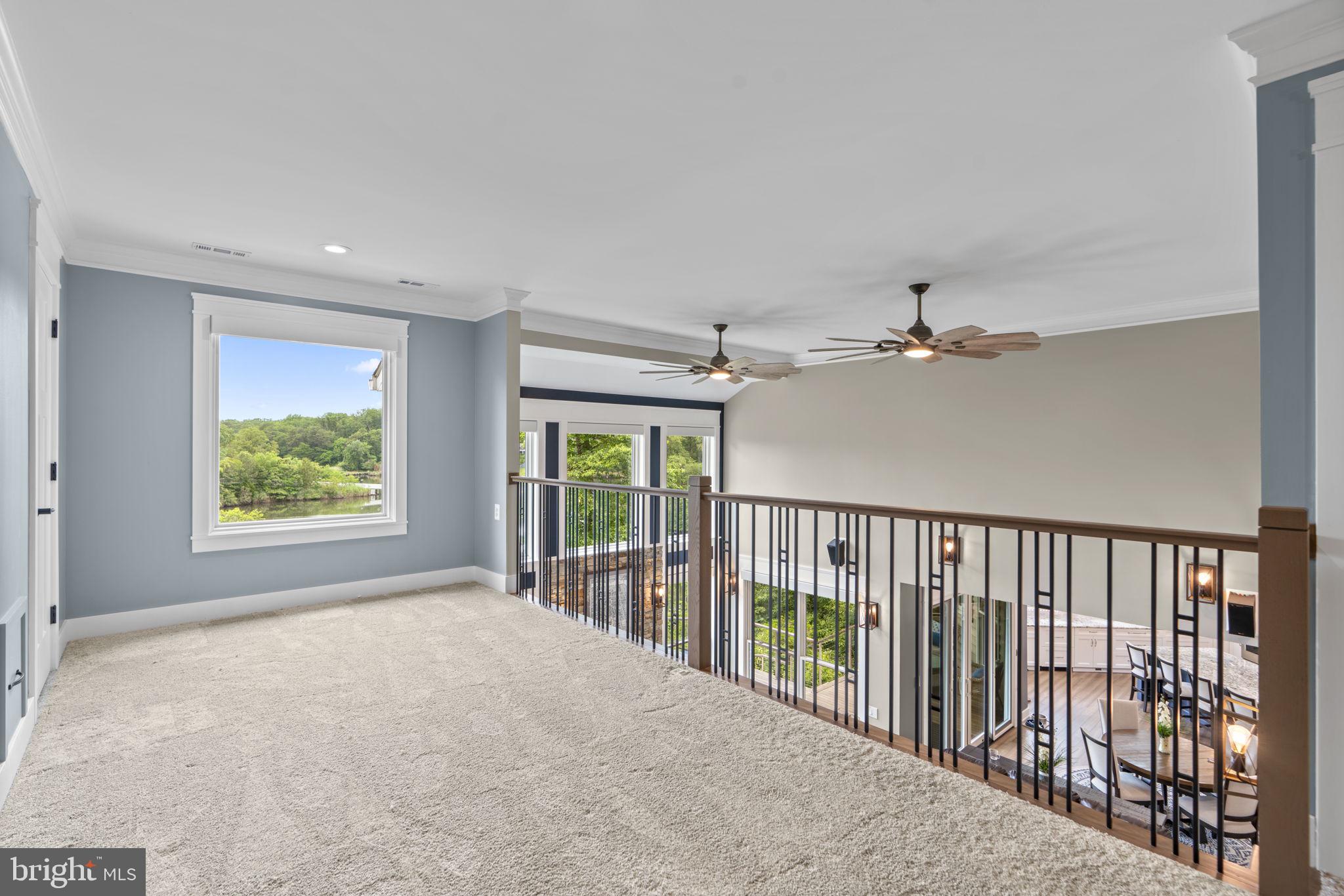 798 Creek View Road Severna Park, MD 21146 - Photo 28 of 72 a view of a hallway with a ceiling fan