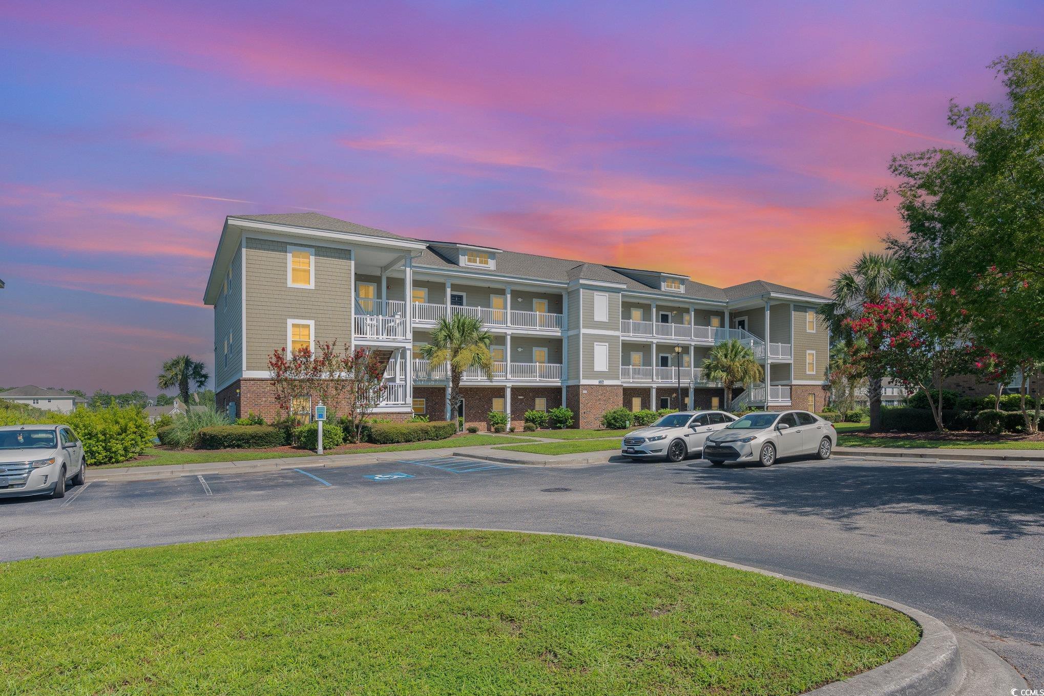 336 Kiskadee Loop, Unit A Conway, SC 29526 - Photo 1 of 27 View of outdoor building at dusk