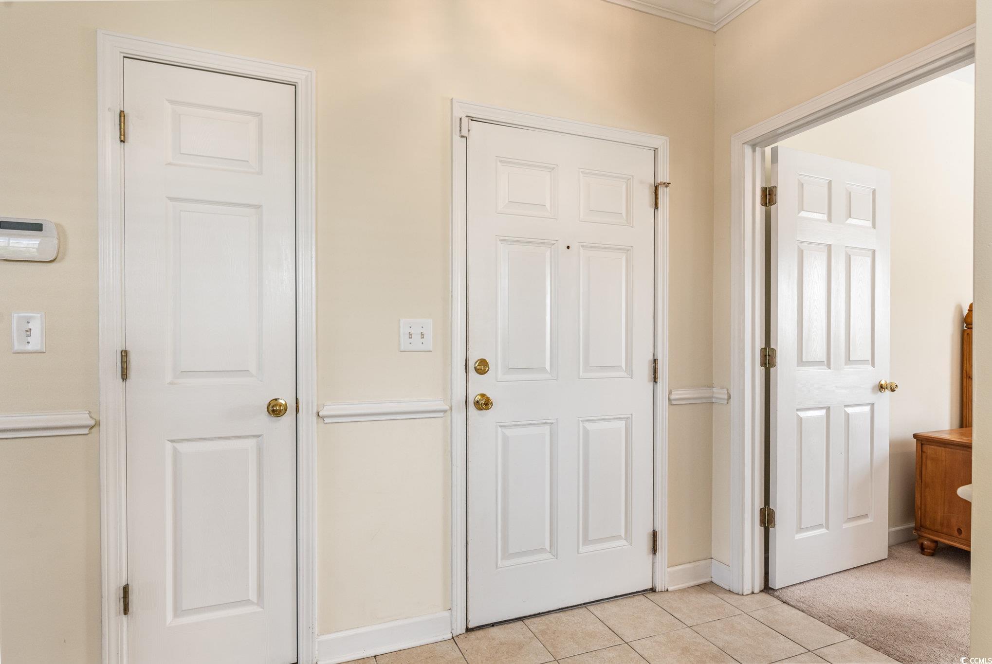336 Kiskadee Loop, Unit A Conway, SC 29526 - Photo 16 of 27 Hallway featuring light tile patterned flooring an